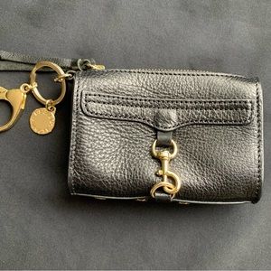 Black 4.5x3 coin purse with gold Embellishments.